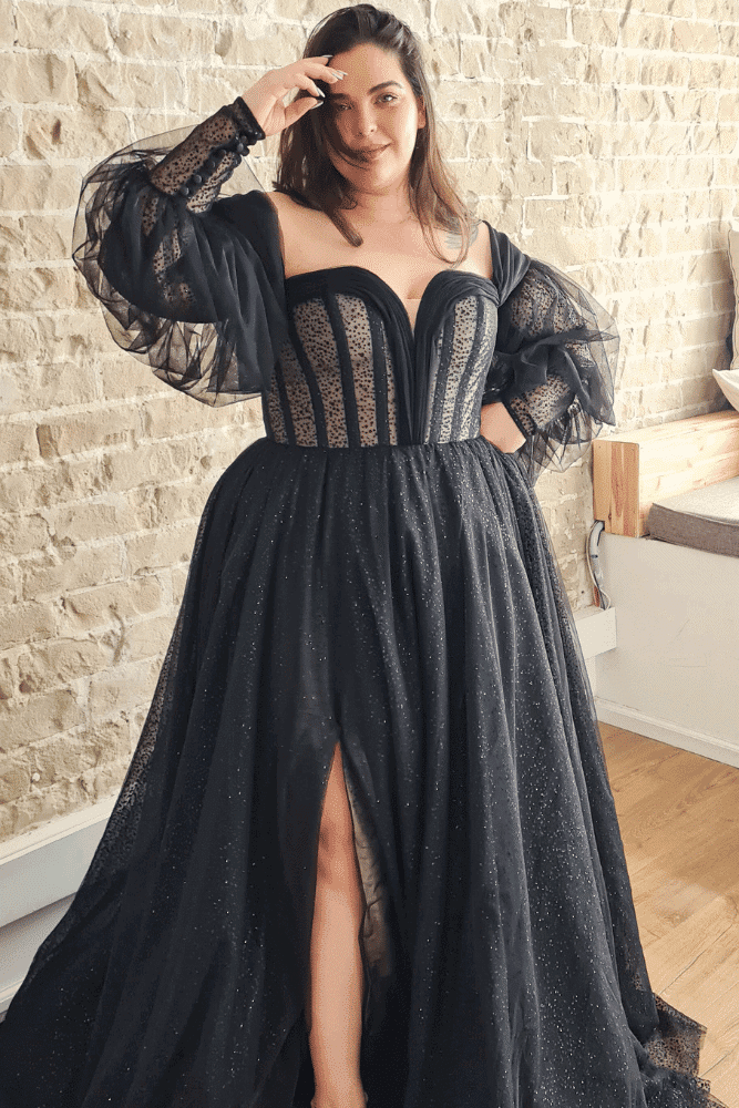 plus-size wedding dress in black featuring a dramatic A-line silhouette with a fitted bodice adorned with vertical stripes. The gown has off-the-shoulder puff sleeves and a thigh-high slit